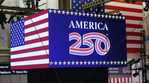 America 250 branding on a billboard at the New York stock exchange. 