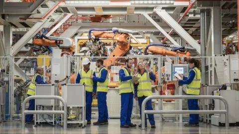 Getty Images Factory workers