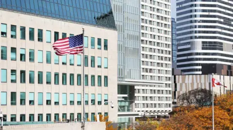 A US flag outside the consulate building in Toronto