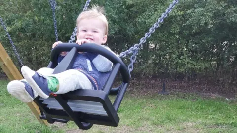 Julia Rogers Louis on his favourite swing