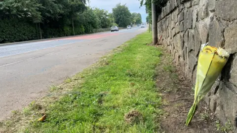 Flowers left at the scene of the crash in Magherafelt
