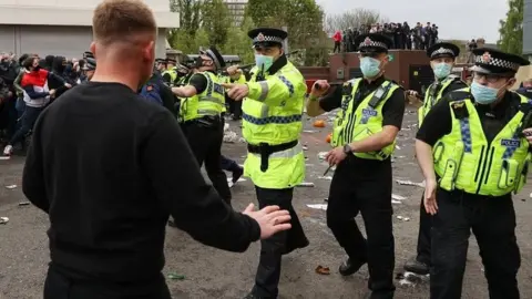 Reuters Greater Manchester Police dealing with protests at Old Trafford