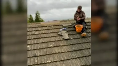 Rogue trader on bungalow roof