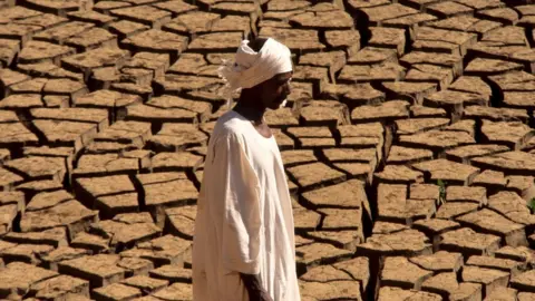 Getty Images A man in the desert in Sudan