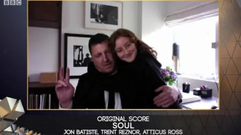 Atticus Ross with his daughter