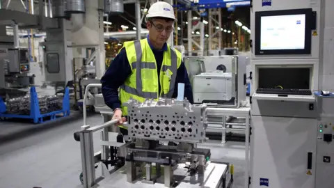 Getty Images Man working in Ford factory