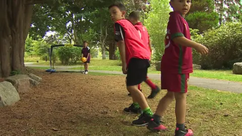 Conwy council has been organising summer play sessions in local parks where children get chance to have a kickabout. NB permission received from all parents involved.