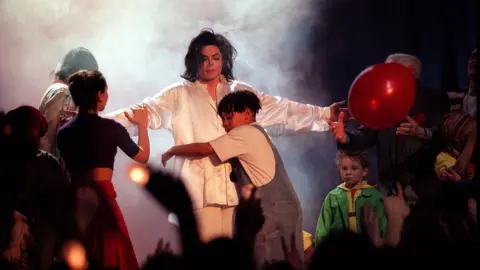 PA Media Michael Jackson performing Earth Song on stage, Brit awards 1996