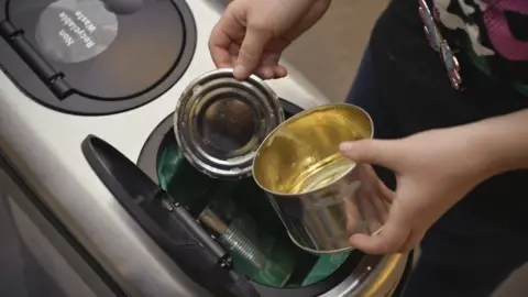 Getty Images Cans recycling