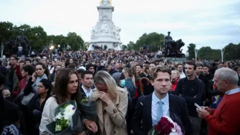 Reuters Crowds outside Buckingham Palace on Thursday, after the death was announced