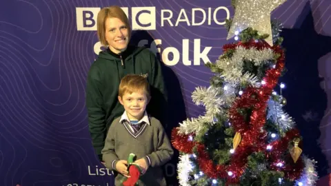 Darren Rozier/BBC Quinn and his mum, Erica