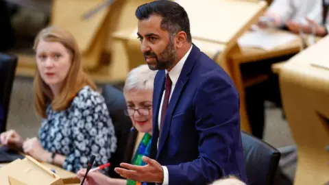 Getty Images Humza Yousaf in parliament