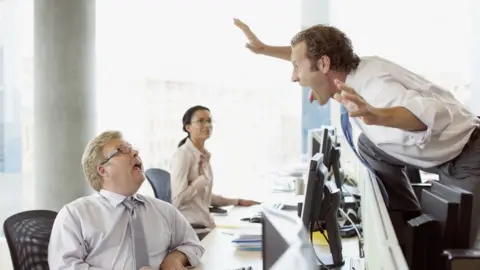 Getty Images Annoying men at work
