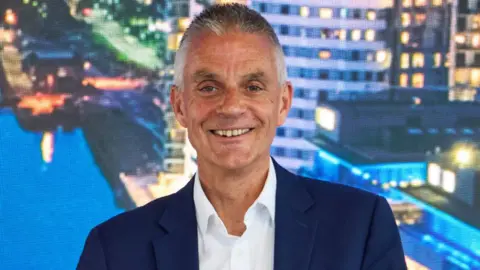 Tim Davie pictured at the BBC's headquarters in Salford ahead of giving his speech