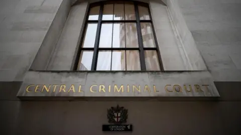 Reuters Old Bailey window with sign reading: Central Criminal Court