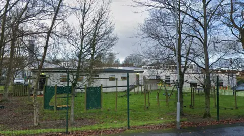 Google Some of the buildings and memorial garden at Trench Road Primary School in Derry