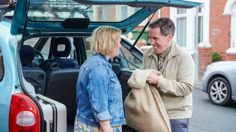 BBC/Toffee International Ltd/Tom Jackson Joanna Page and Rob Brydon pictured connected  acceptable   astatine  Trinity Street successful  Barry.