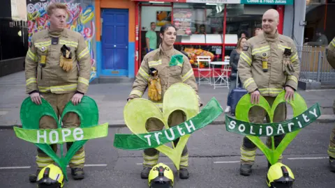 PA Media Grenfell firefighters