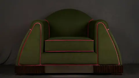 Vivek Gandhi A green art deco-style chair with hidden compartments in the armrests. The art deco movement became popular in India in the 1930s.
