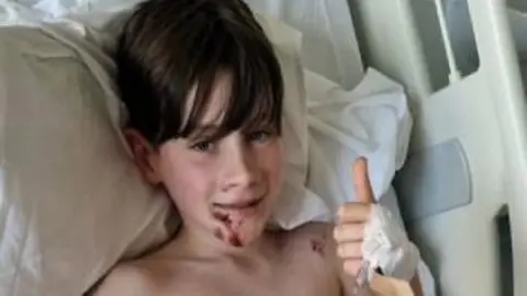 FAMILY PHOTO His mum said the youngster could have been killed if the vehicle had been going faster than 20mph