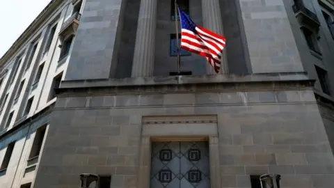 Reuters US justice department building