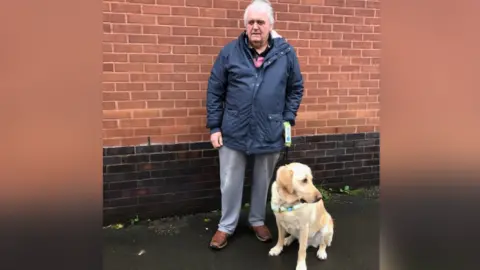 Contributed Graham and guide dog