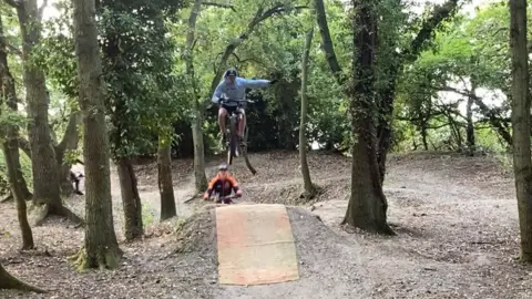 Luke Deal/BBC Ethan J and Ethan R pictured making use of one of the ramps with their bikes at the track in Hadleigh