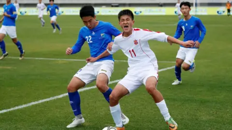 Reuters South and North Korea"s youths play a soccer game during the 5th Ari Sports Cup in Chuncheon