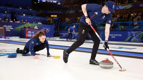 Jennifer Dodds and Bruce Moaut during the mixed doubles bronze medal match at the Milan Cortina Olympics.