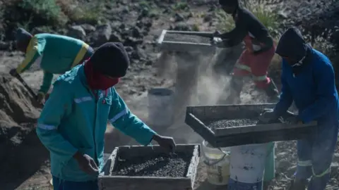 Getty Images Mine workers