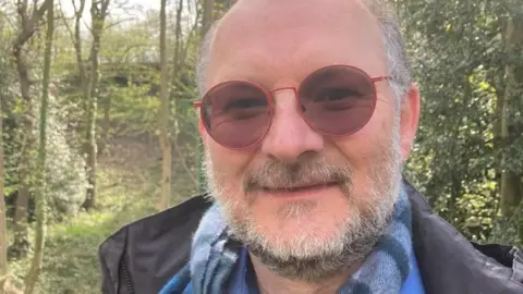 Michelle Lyons / BBC Professor Ross Cameron