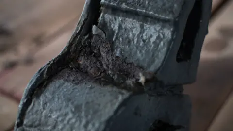 Damaged section of ironwork