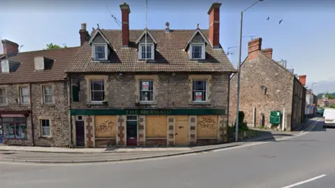 The disused Mermaid Inn on the corner of Tucker Street and Portway in Wells