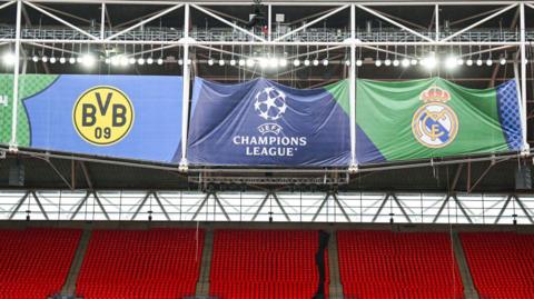 A banner sports Borussia Dortmund and Real Madrid's crests at Wembley before the 2024 Champions League final