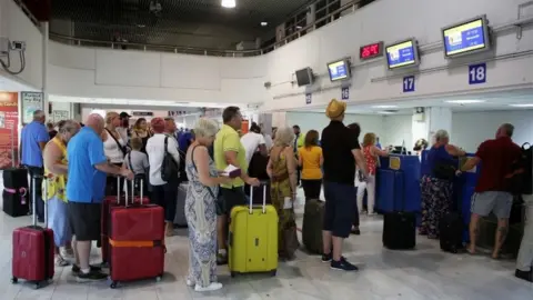 Reuters Passengers in Crete