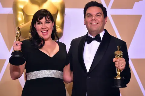 AFP Kristen Anderson-Lopez and Robert Lopez