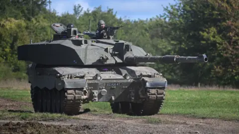 Challenger 2 main battle tank is displayed for the families watching The Royal Tank Regiment Regimental Parade