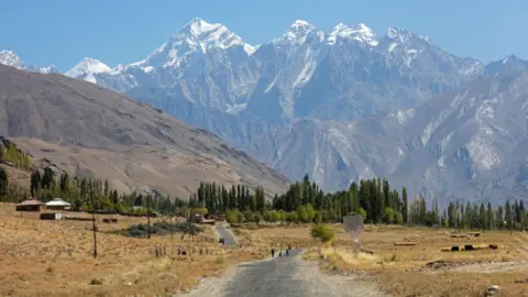 Arterra/Universal Images Group/Getty Images Snow covered mountain peaks of the Pamir Mountains and the Pamir Highway in the Gorno-Badakhshan province, Tajikistan