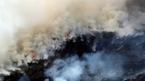 Reuters Fire on Winter Hill