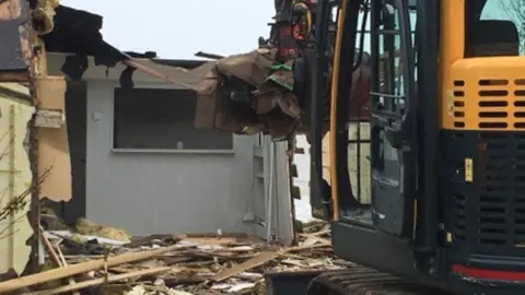 Demolition of chalet