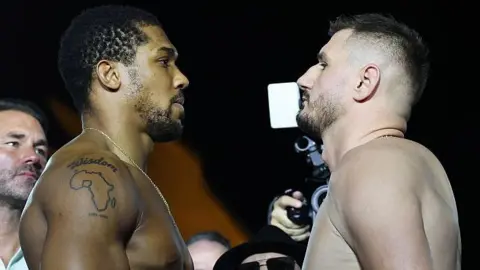 Anthony Joshua and Kristian Prenga face off