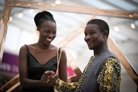 LOU BENOIST / AFP Anna Diakhere Thiandoum (L) and  Ibrahima Mbaye.