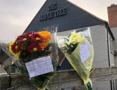 Floral tributes at Maple Tree pub, Doncaster
