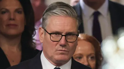 A close-up of Sir Keir Starmer in a crowd.