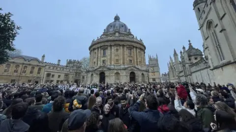 Crowds of people in Oxford gathering for May Day