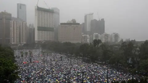 Getty Images Thousands of demonstrators gather at Victoria Park area during a protest organized by the Civil Human Rights Front