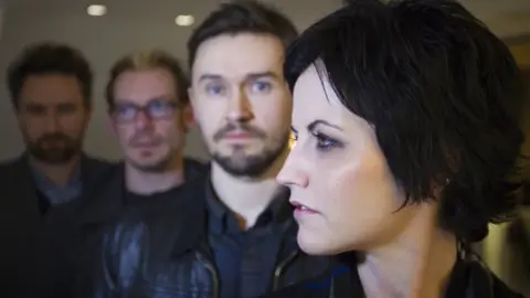 Getty Images The Cranberries in 2012 (L-R): Noel Hogan, Fergal Lawler, Mike Hogan and Dolores O'Riordan