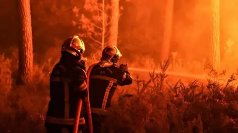 EPA Firefighters tackling blaze near Hostens, Gironde, 11 Aug 22