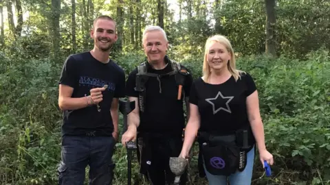 Karen Wason Richard (left) with Victoria and her husband, also Richard
