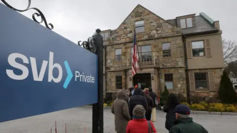 Reuters customers wait outside Silicon Valley Bank